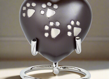 Royal Rapture Heart Urn in Red color with paw print for pet memorial.